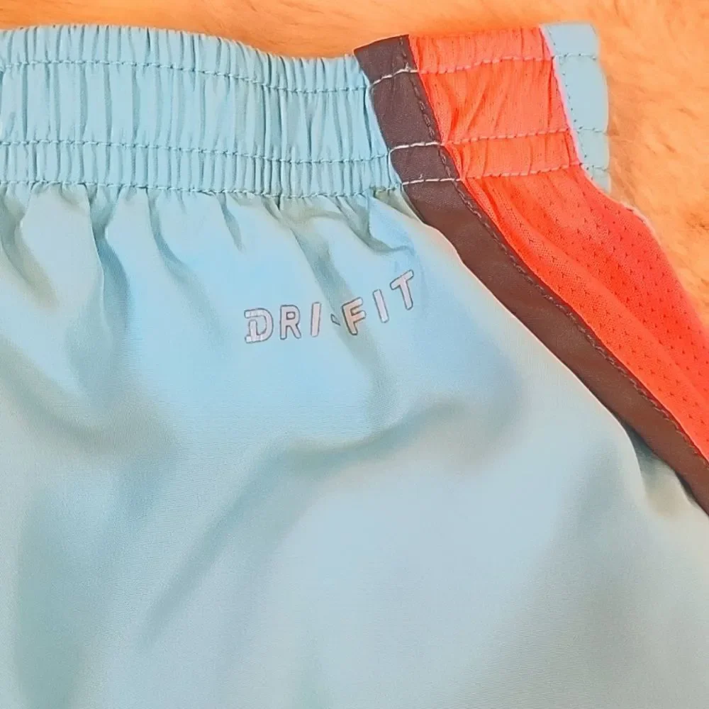 NIKE DRI-FIT 2-IN-1 LIGHT BLUE AND CORAL RUNNING SHIRTS, SIZE 4